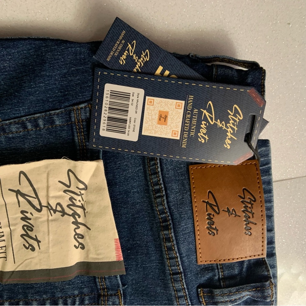 Brand New means and Jrs jeans sizes on item.